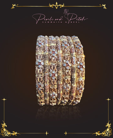 Antique style set of 7 bangles in copper and gold